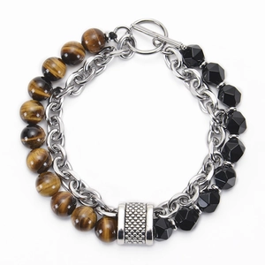 Macro detail of double-layer men's bracelet with tiger eye stones and silver OT buckle