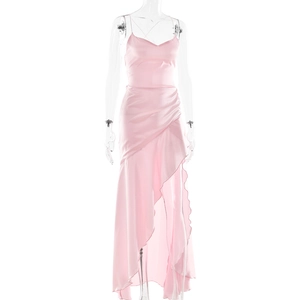 Detailed view of pink satin dress featuring elegant ruffles and high slit design