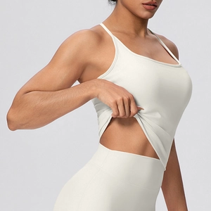 Detail view of the lightweight elastic fabric on cream white racerback sports vest
