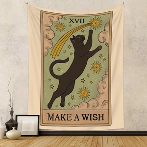Close-up of black cat tarot tapestry with XVII and Make a Wish text on fabric