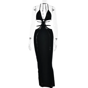 Close-up of black knit mini dress featuring halter neck and cutout tie-waist details
