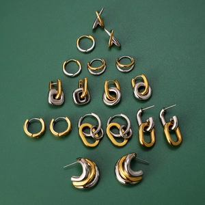 Collection de boucles d'oreilles créoles bicolores en acier inoxydable doré et argent