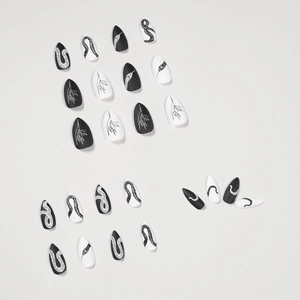 Schwarz-weiße Stiletto-Klebenägel mit feinen Schlangenmustern und Blattmotiven im Set