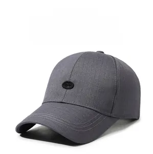Detail view of dark grey baseball cap showing SP patch and reinforced brim stitching