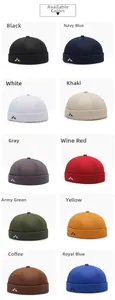Grid view of brimless docker caps in ten colors with mountain embroidery detail