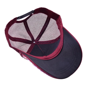 Detail view of the breathable mesh back and adjustable snapback closure on trucker hat