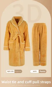 Detail view of thick yellow fleece bathrobe set with white piping and waist tie