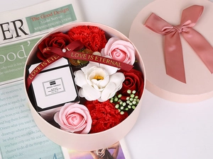Floral soap box with pink roses and a 50g scented candle featuring a love ribbon
