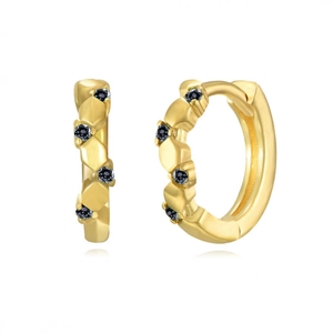 Macro shot of gold huggie earrings with micro-set dark grey round zircons and geometric facets