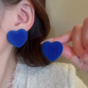 Klein blue velvet heart stud earrings with silver pins for a vintage aesthetic look