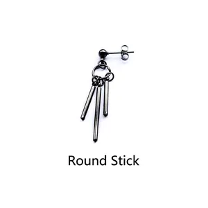 Detail view of the black cylindrical metal pendants and minimalist circular ear clip design