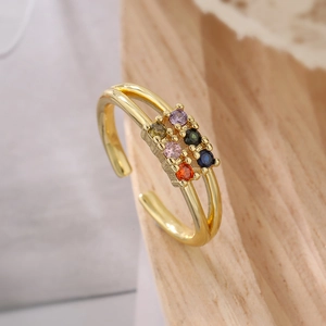 Macro shot of 18K gold plated ring featuring six vibrant colorful zircon gemstones
