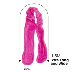 Close-up of extra long and wide pink flannel heatless hair curler measuring 1.5M by 15CM