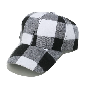 Classic British style black and white buffalo plaid baseball cap with thick woven fabric