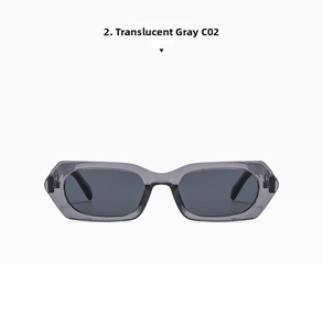 Close-up of translucent grey rectangular frame sunglasses with dark grey tinted lenses