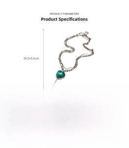 Double-layered copper necklace featuring a green heart zircon pendant and adjustable chain