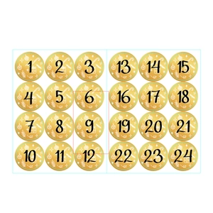 Détail de 24 autocollants dorés du calendrier de l'Avent avec motifs de Noël blancs