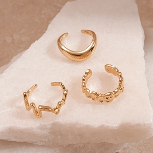 Three-piece gold-plated S925 silver ear cuff set featuring irregular and smiley designs