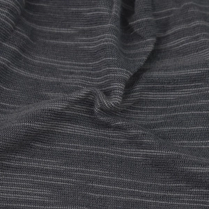 Breathable dark grey knitted beanie hat for men and women featuring a soft ribbed texture