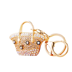 Sparkling crystal handbag keychain with colorful rhinestones and black flower accent