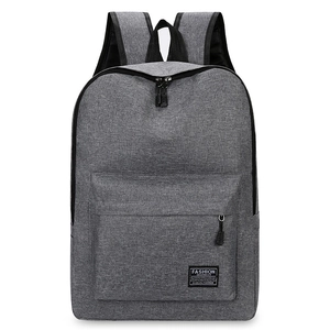 Minimalist grey canvas laptop backpack with front pocket for travel and outdoor hiking