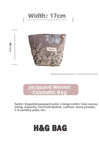 Detail view of jacquard makeup bag showing 17x14cm dimensions and floral fabric texture