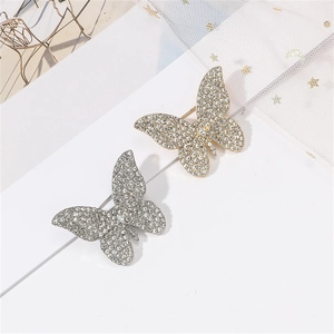 Elegant butterfly brooch pin with sparkling rhinestones in gold and silver finish