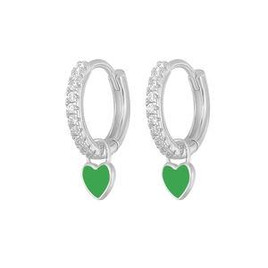 Detail of silver hoop earrings with green heart charms and white zircon insets
