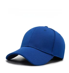 Detailed view of dark blue baseball cap with breathable mesh texture and decorative stitching