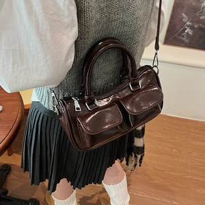 Retro deep brown glossy leather saddle shoulder bag with dual exterior pockets