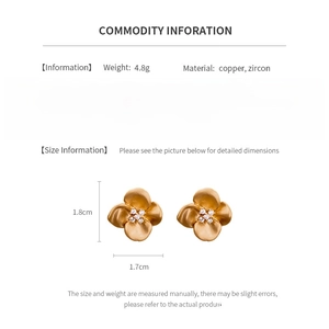 Detailed size chart of gold flower earrings with copper and zircon material specs