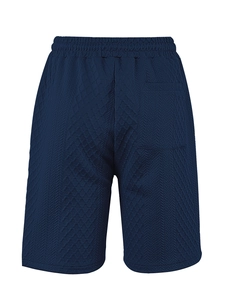 Detailed back view of dark blue waffle knit men's shorts with elastic drawstring waist