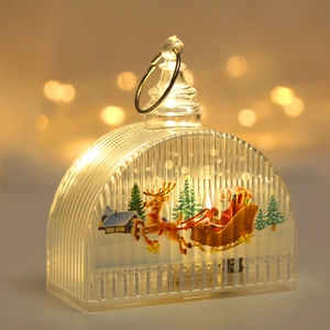 Detail of LED Christmas lantern featuring Santa and reindeer graphics with vertical ribbing