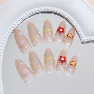 Sweet almond-shaped press-on nails with colorful hand-painted flower and star patterns
