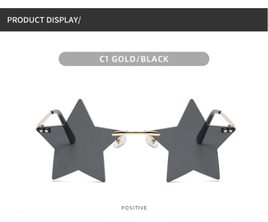 Front view of rimless star-shaped sunglasses with gold metal frame and black lenses