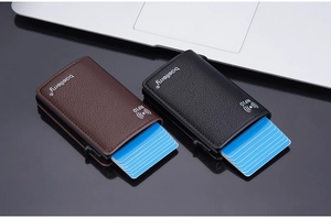 Macro detail of lychee grain leather wallet with RFID metal box and pop-up card mechanism