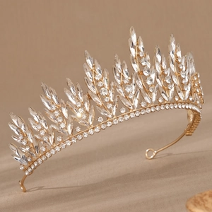 Luxurious gold leaf bridal crown with sparkling crystals for weddings and formal parties