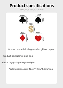 Glittery poker suits and dollar sign cake toppers for casino theme party decorations