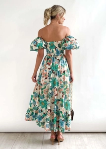 Rear view of off-shoulder floral midi dress with elastic smocking and tiered skirt detail