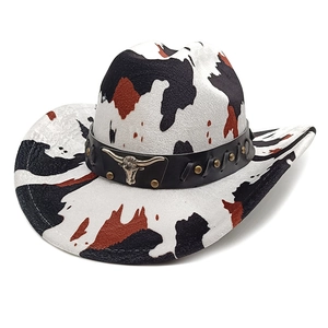 Western cow print cowboy hat with vintage bull head metal ornament and leather band