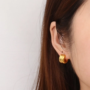 Chunky gold-plated C-shaped hoop earrings for women with a polished mirror finish
