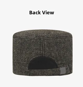 Rear view of brown herringbone flat cap showing mesh back and adjustable buckle