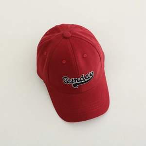 Deep red cotton baseball cap with white Sunday embroidery and a pre-curved brim design