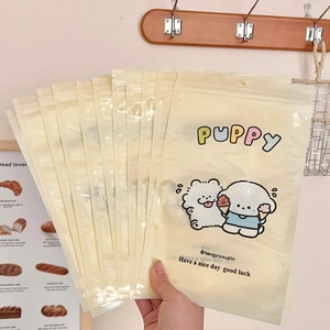 Detail of cute puppy resealable bags with matte texture and convenient hanging holes