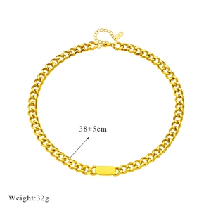 Detail of gold Cuban link necklace featuring 38+5cm length and weight 32g tag