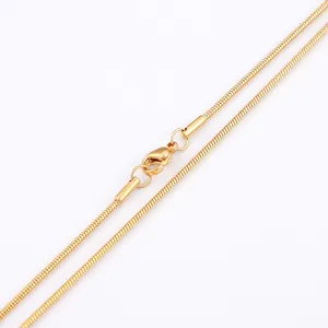 Polished gold round snake bone chain necklace with secure lobster clasp on white background