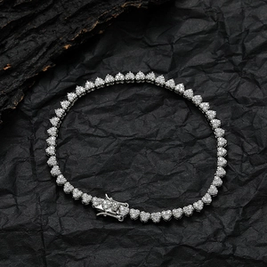 Close-up of heart-shaped tennis chain with micro-pave zircons and double safety clasp