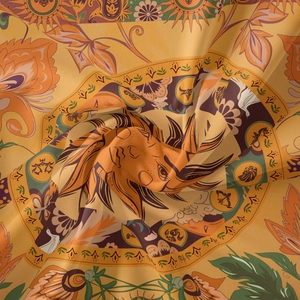 Détail macro de tapisserie tarot bohème montrant motifs solaires et zodiaque