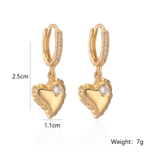 Detail view of gold heart earrings with zircon studs and size dimensions 2.5cm height