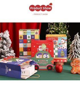 Close-up of assorted Christmas gift bags with festive patterns and golden braided handles
